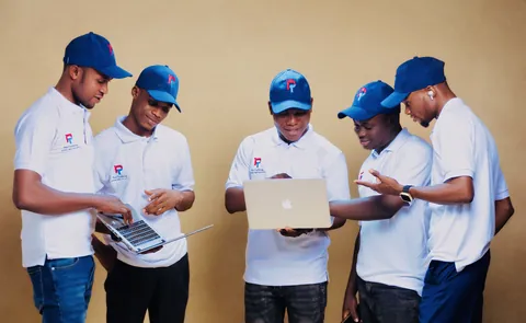 The Paultechnolog team working together on a client project